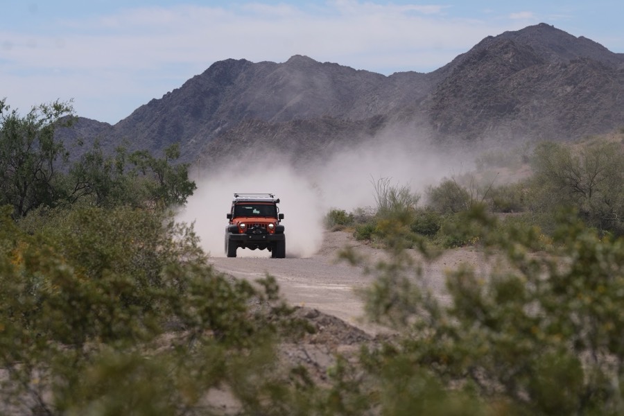 Kicking up dust on a desert road